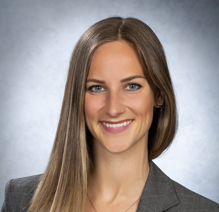 Caucasian, blonde woman smiling for the camera