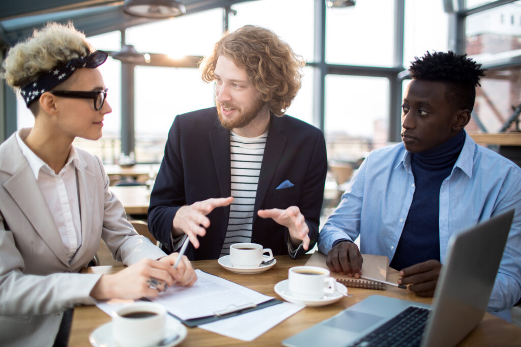 people talking at a table