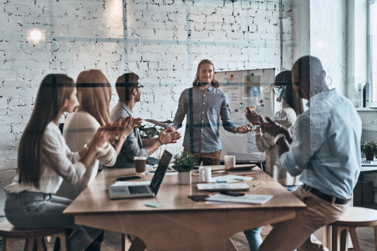 person makes a presentation in a boardroom