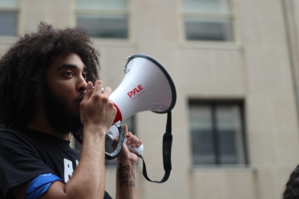 African American man using a megaphone